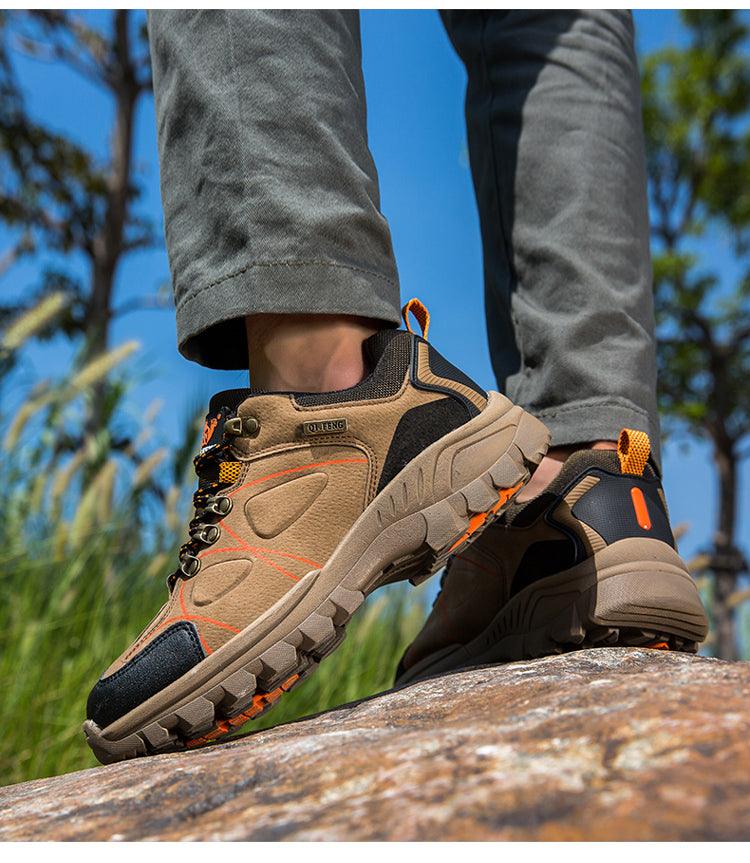 Stevvex men's waterproof hiking boots in tan brown with orange accents and rugged outsole on Tampa Home & Garden Store