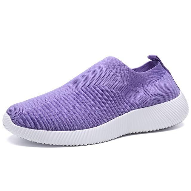 Women's purple knit slip-on sneakers with breathable mesh and white ribbed outsole on Tampa Home & Garden Store