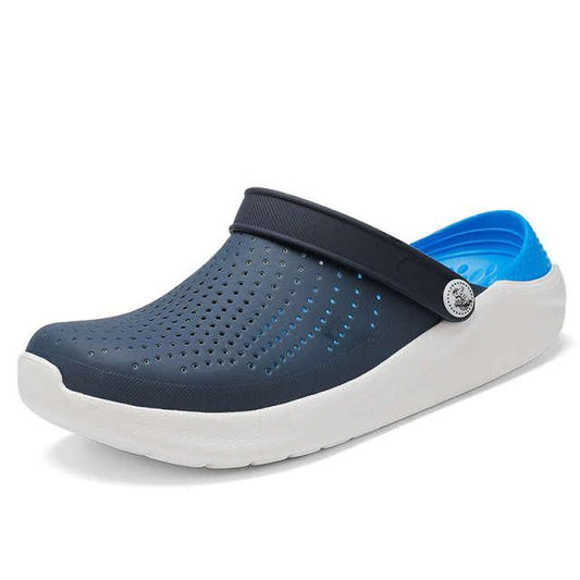 Stevvex women's navy perforated clogs with white sole and blue interior on Tampa Home & Garden Store