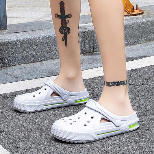 Stevvex white garden clog pair with adjustable strap and neon-green sole accents on Tampa Home & Garden Store