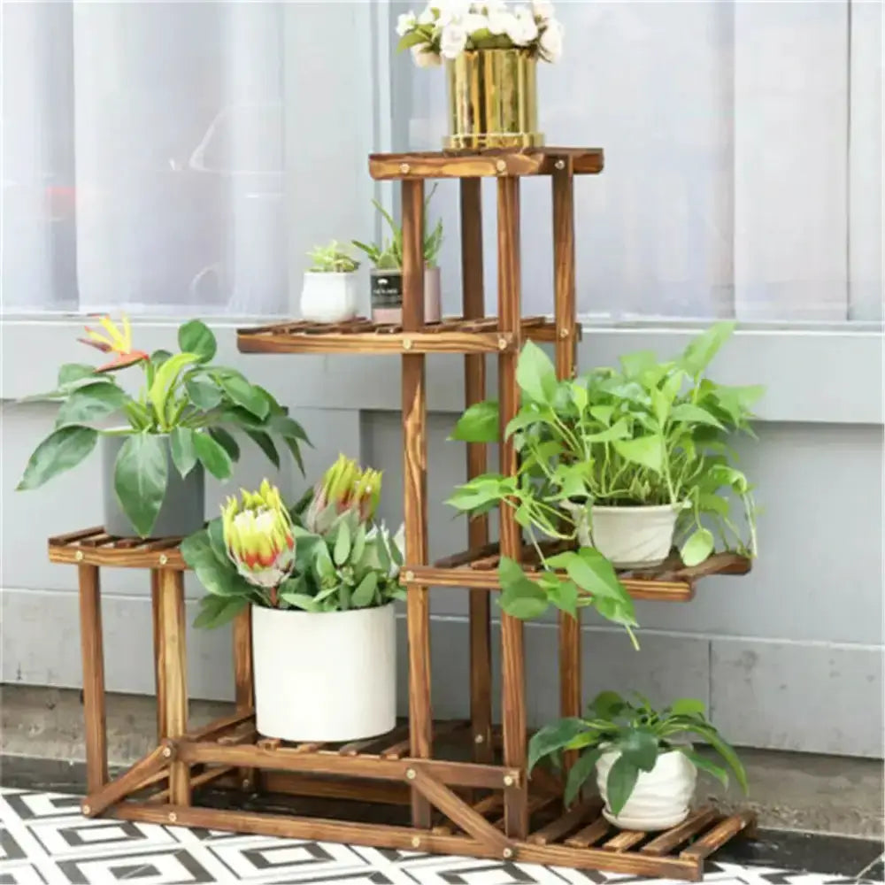 6 Tier Natural Wood Plant Stand in living room setup with several green potted plants Decorbites on Tampa Home & Garden Store