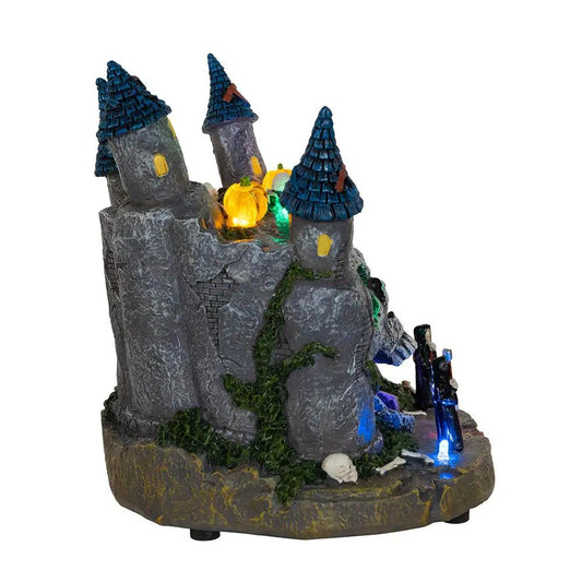 Lighted Skull Castle with Color LED gray stone, blue cone towers The Country Christmas Loft on Tampa Home & Garden Store