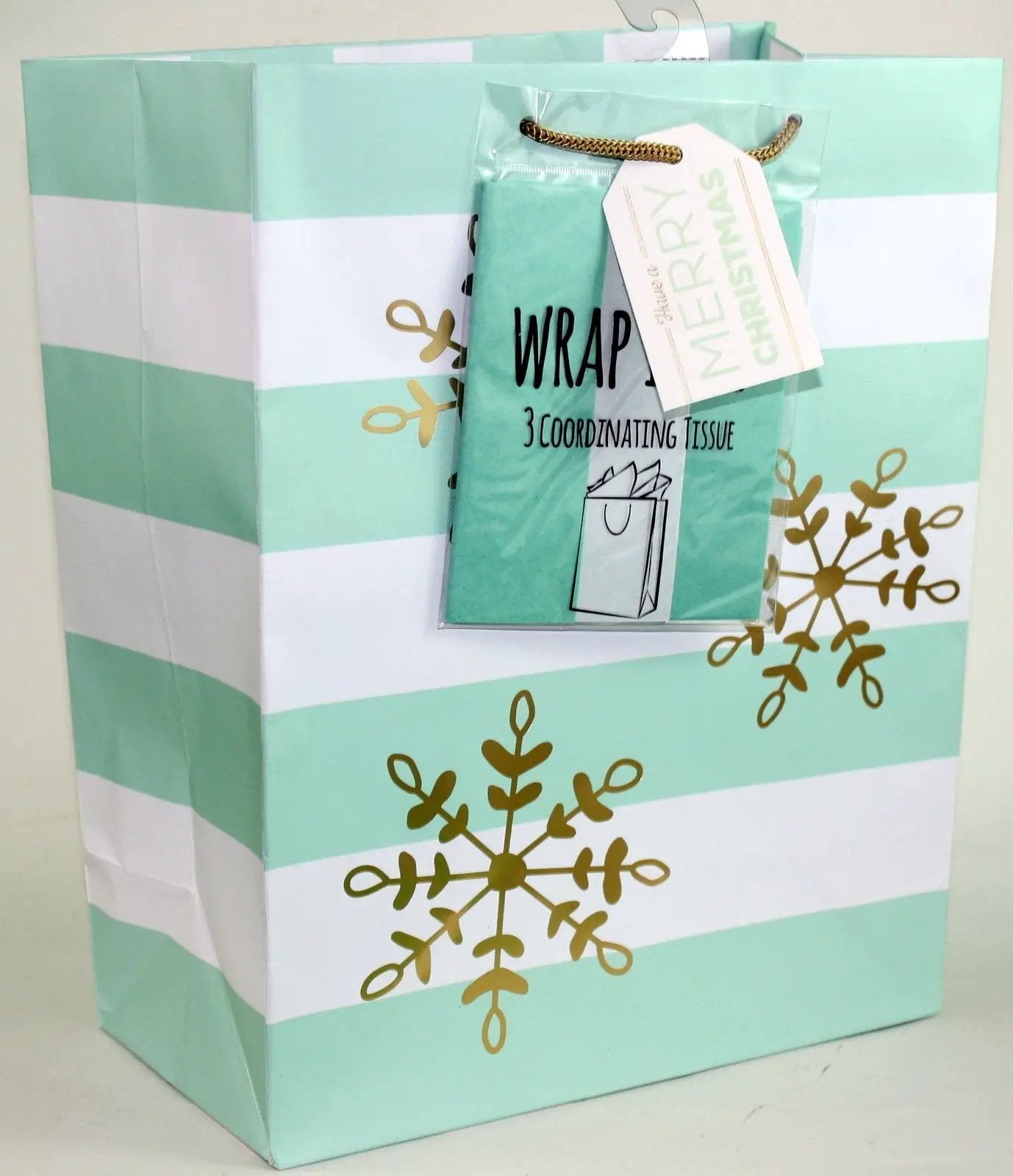 Gift bag with mint green and white stripes, gold snowflake accents, matching tissue and tag Country Christmas Loft on Tampa Home & Garden Store
