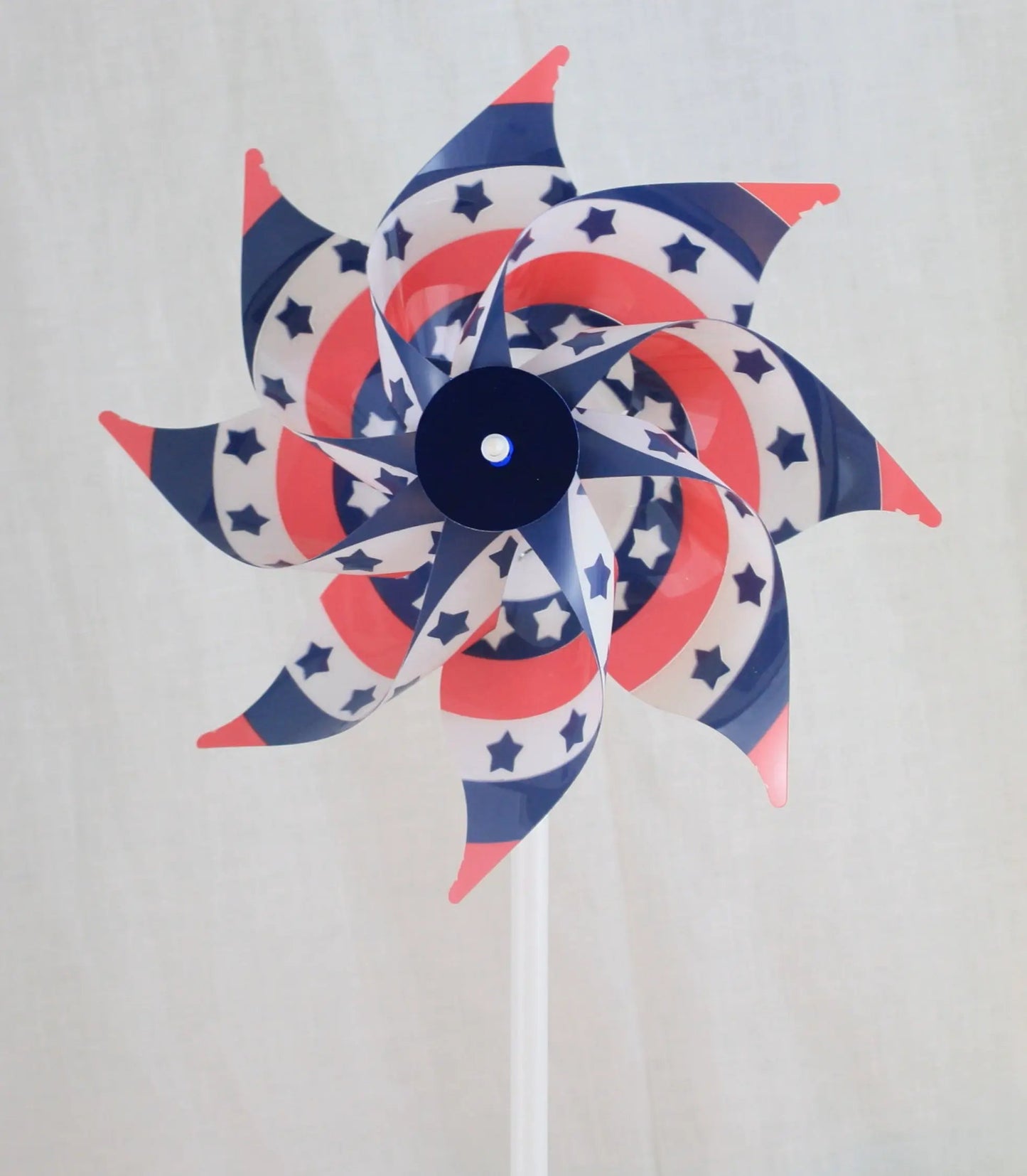 PVC pinwheel Old Glory Star wind wheel garden decor in red white and blue with star pattern on Tampa Home & Garden Store