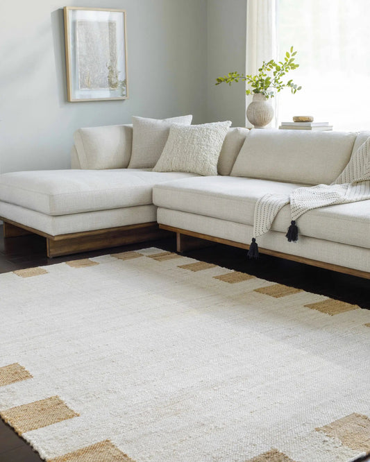 Yuval Dotted Bordered Jute Rug in cream with tan border from Boutique Rugs on Tampa Home & Garden Store