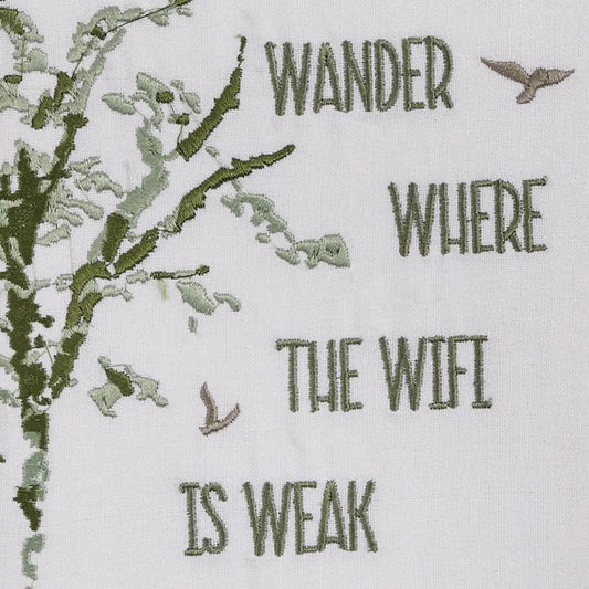 Decorative white dish towel with green embroidery Wander Where Wifi Is Weak and branch motif on Tampa Home & Garden Store