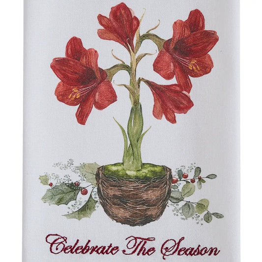 Celebrate The Season Amaryllis Dishtowel with red blooms in a wicker basket on Tampa Home & Garden Store