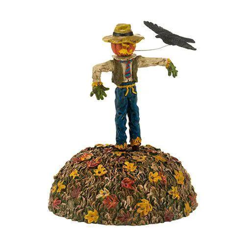 I've Got My Eye On You Scarecrow decor figurine on autumn leaf mound with a crow on Tampa Home & Garden Store