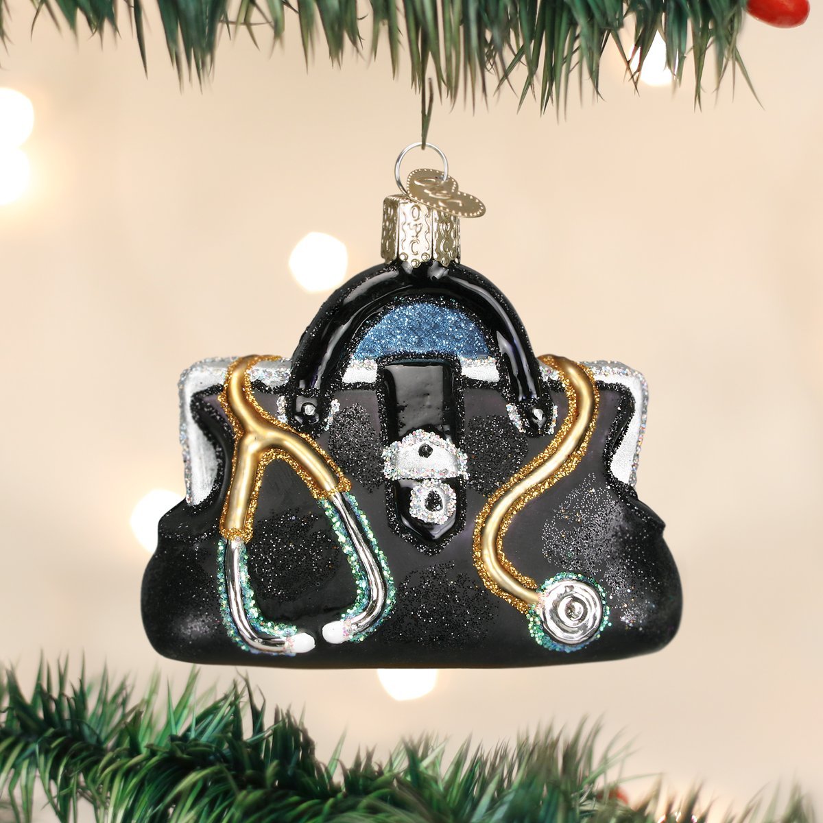 Old World Christmas Doctor Bag Ornament glass black glitter bag with gold trim and stethoscope accents on Tampa Home & Garden Store
