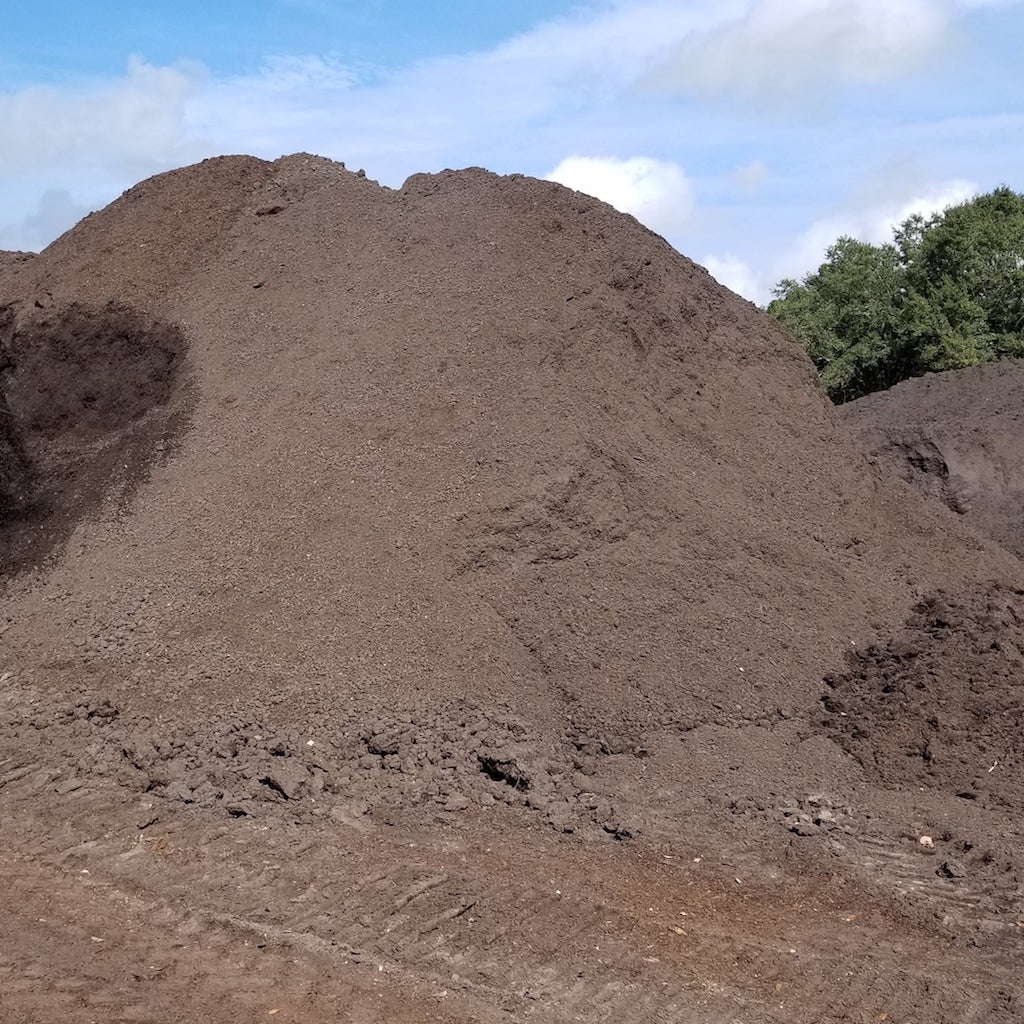 9 cubic yard bulk Premium 50/50 compost pile for gardens, brown soil-like texture on Tampa Home & Garden Store