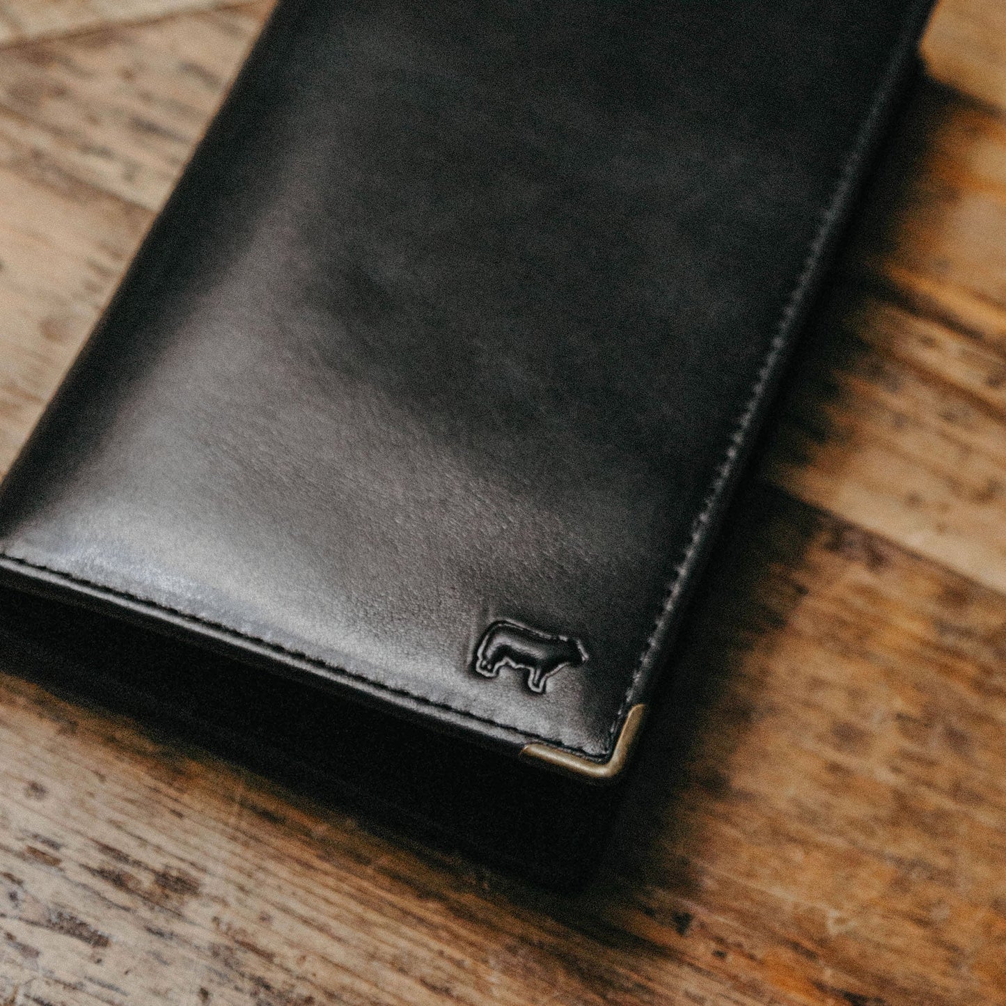 William Pocket Secretary Wallet in black leather with stitching and Will Leather Goods logo on Tampa Home & Garden Store