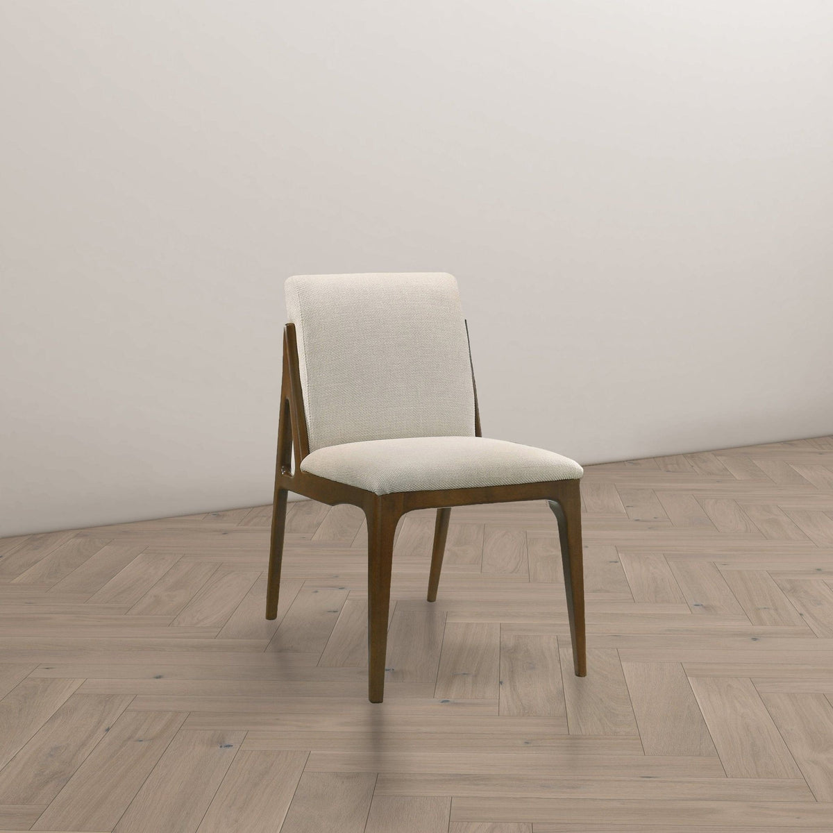 Elegant beige upholstered dining chair with dark wood legs on Tampa Home & Garden Store