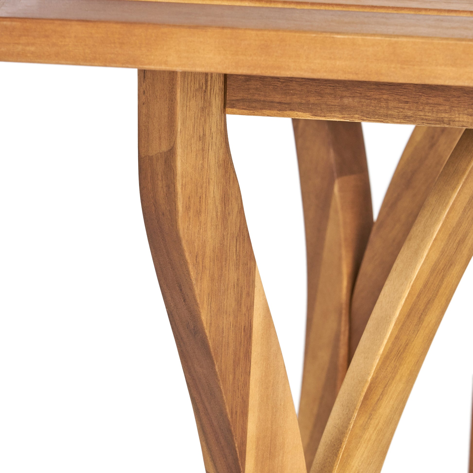 Outdoor 7-piece patio dining set in rustic acacia wood, close-up of table edge and legs on Tampa Home & Garden Store