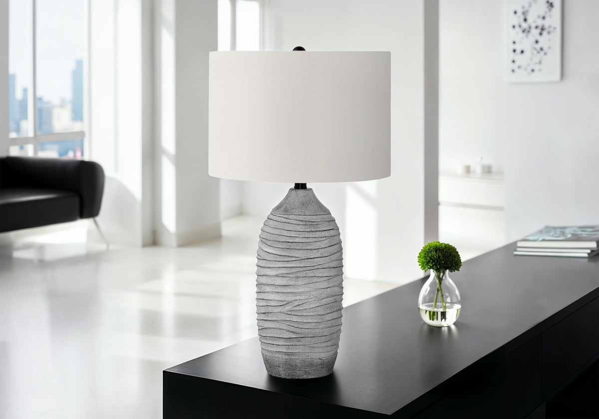 Table lamp with textured gray resin base and cream shade, modern design by HouseOfZazla on Tampa Home & Garden Store