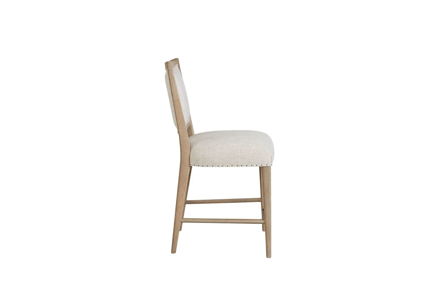 Counter stool sand-colored with beige upholstered seat and back, light wood legs on Tampa Home & Garden Store
