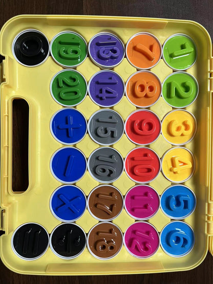 Smart egg educational toy set with colorful number lids 0–9 in a yellow tray on Tampa Home & Garden Store