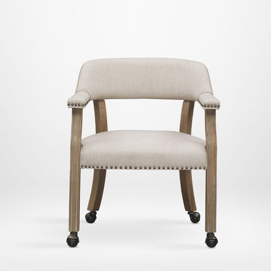 Monroe beige linen dining and game armchair with nailhead trim and wooden legs on Tampa Home & Garden Store