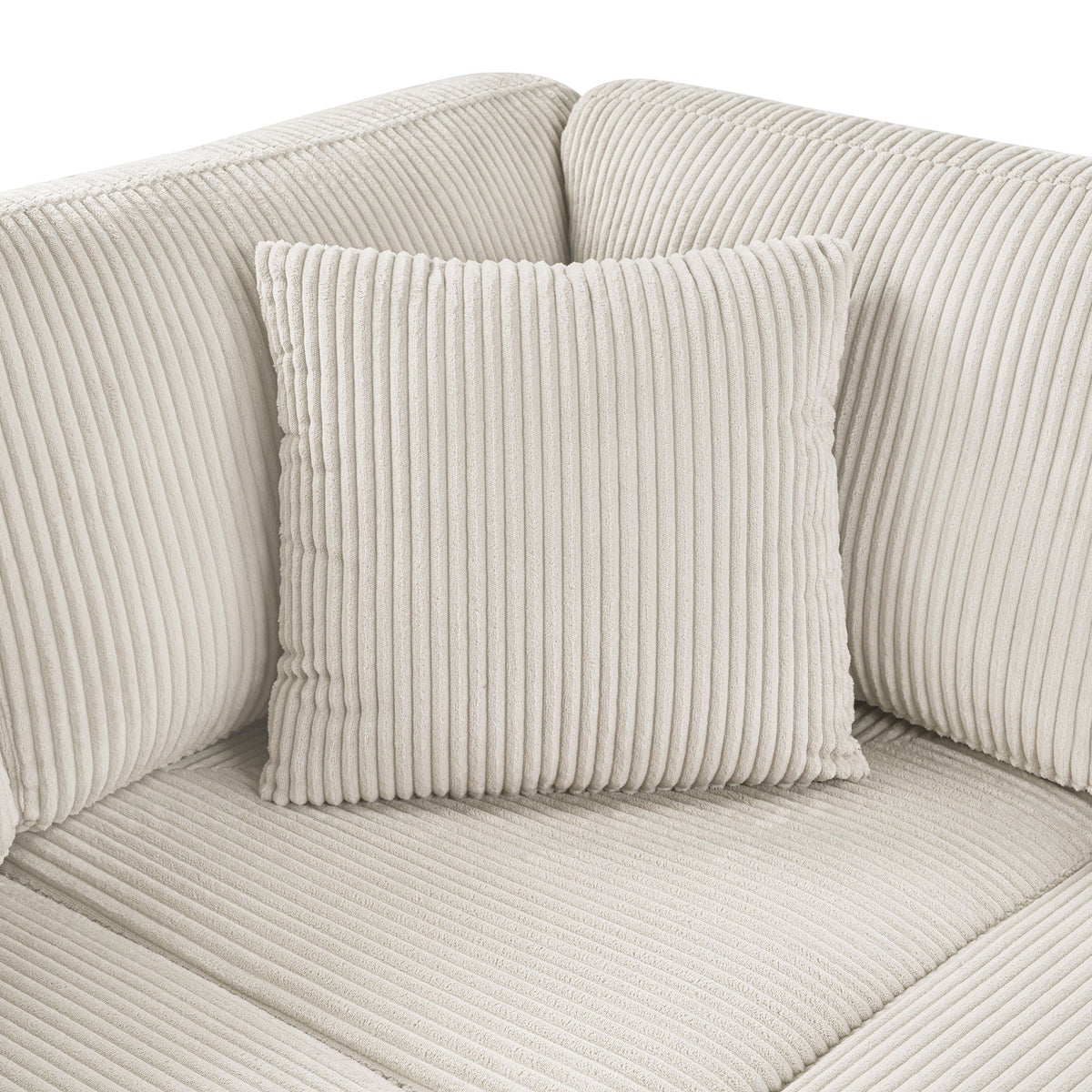 Oversized U-shaped sectional sofa with chaise lounge in beige corduroy and three pillows on Tampa Home & Garden Store