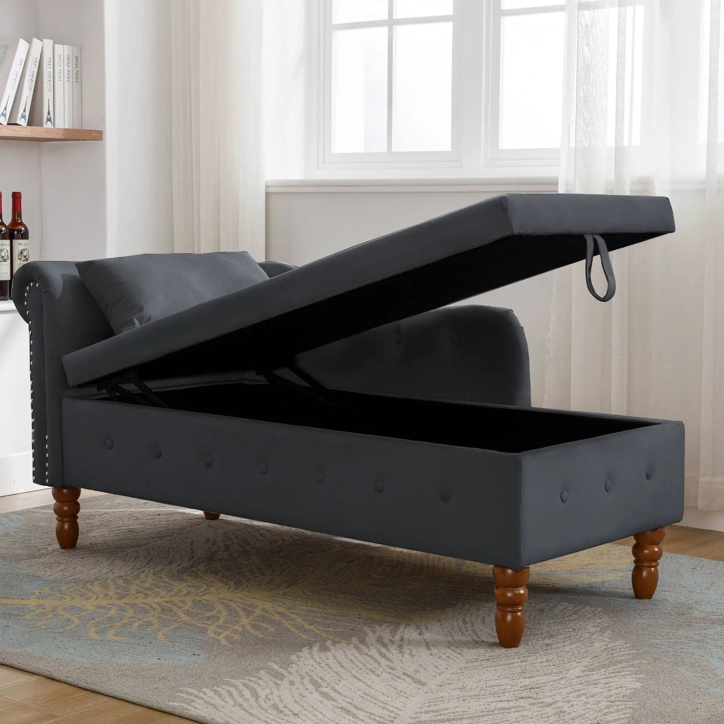 Chaise lounge by Unique Piece Furniture in black upholstery with nailhead trim and pillow on Tampa Home & Garden Store