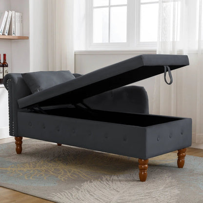 Chaise lounge by Unique Piece Furniture in black upholstery with nailhead trim and pillow on Tampa Home & Garden Store