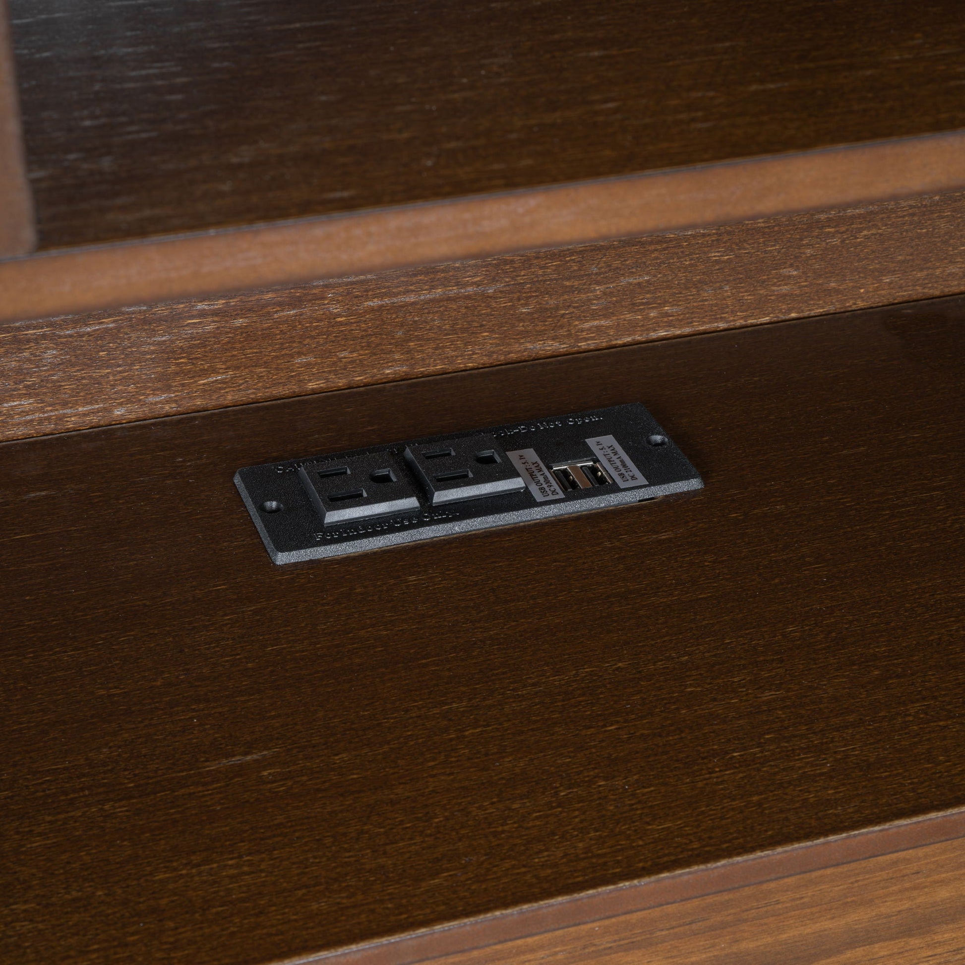 Platform bed frame panel in dark walnut wood with prominent grain and edge trim on Tampa Home & Garden Store