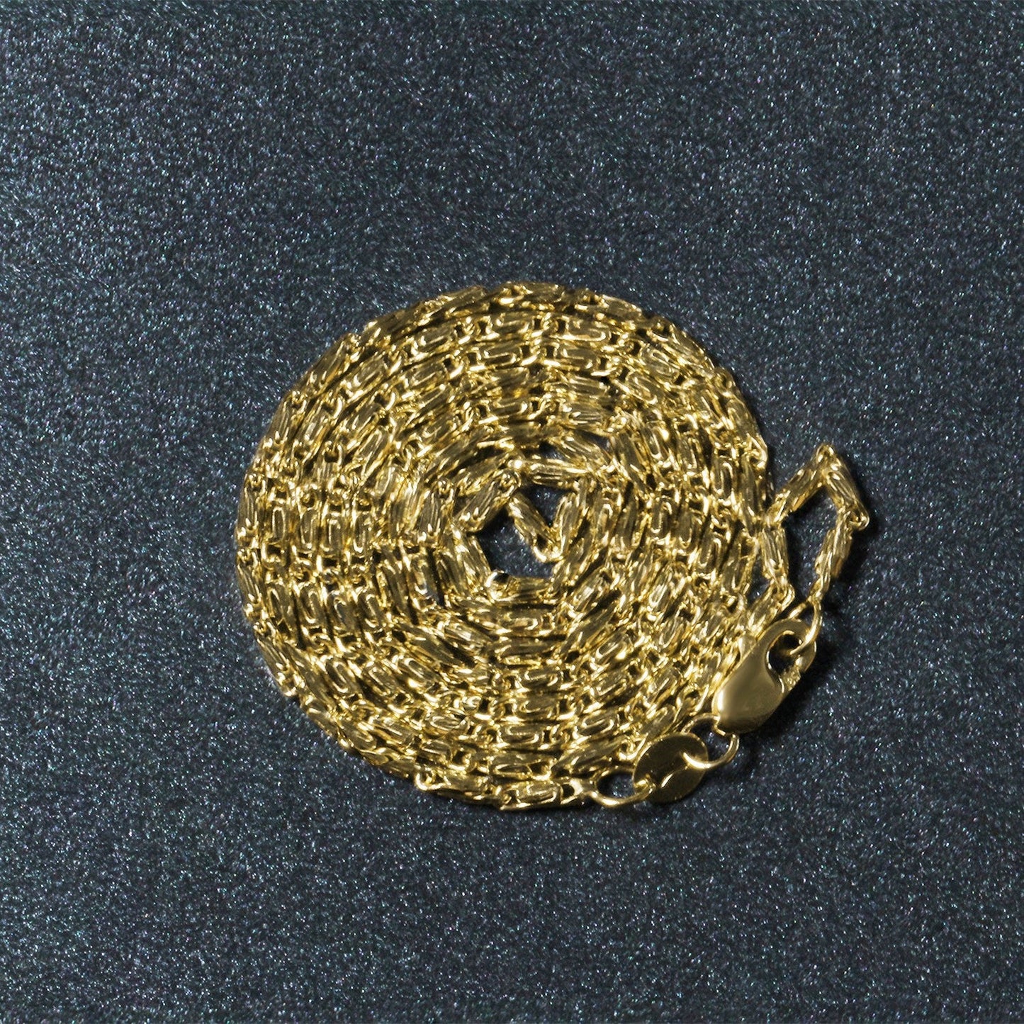 14k yellow gold diamond-cut fancy links necklace, 1.5mm, coiled chain display on Tampa Home & Garden Store