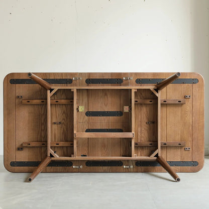 Round Corner Diagonal Leg Telescopic Dining Table underside in oak wood with metal hardware on Tampa Home & Garden Store