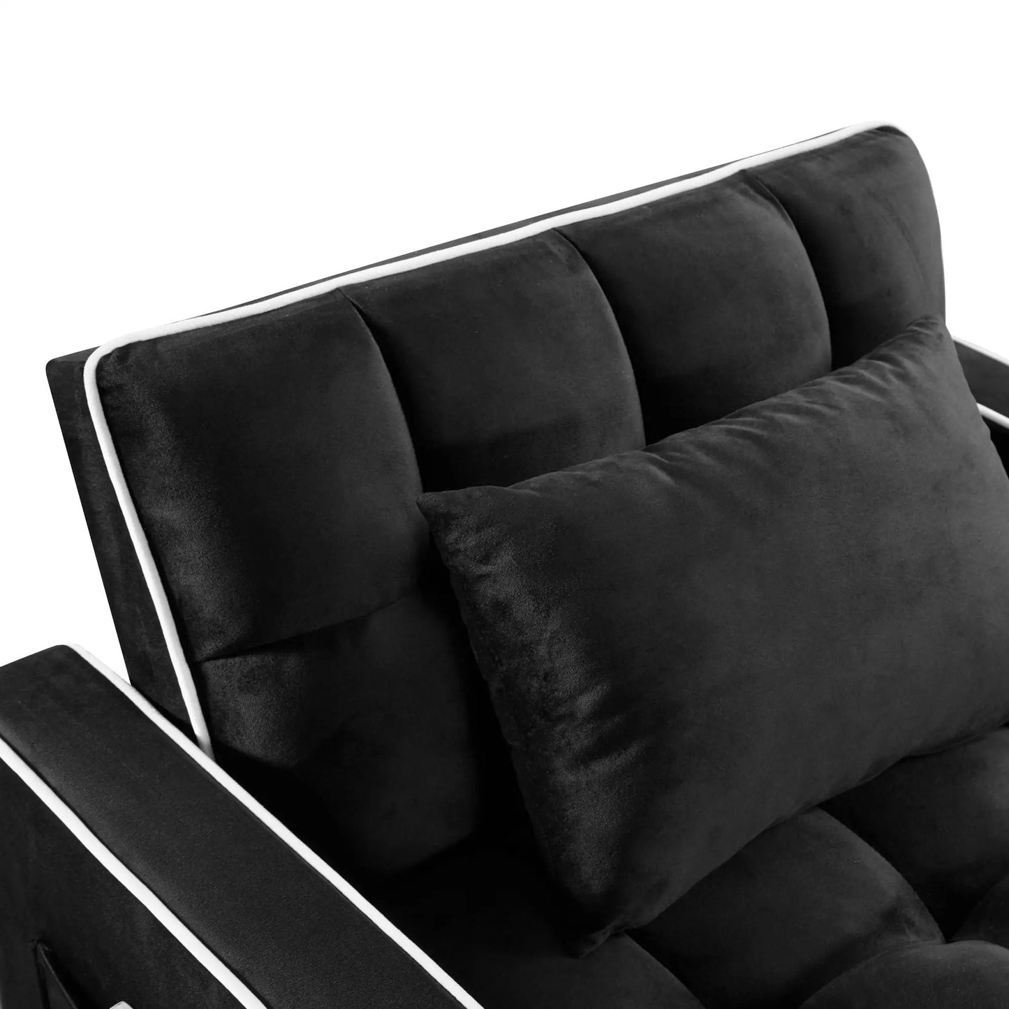 Convertible sleeper chair with black fabric upholstery and white piping along edges on Tampa Home & Garden Store