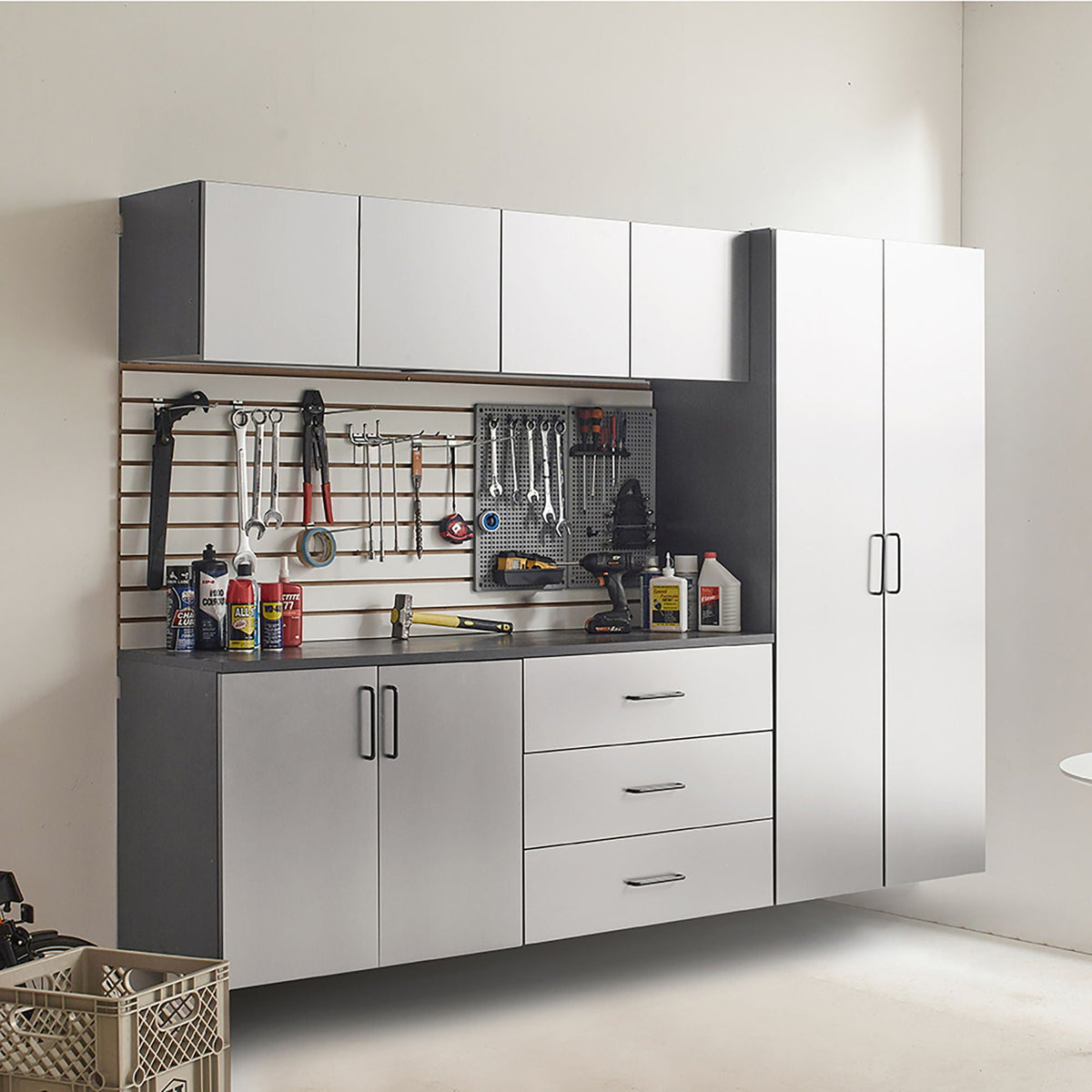 Metallic gray garage cabinet set with soft-closing drawers and white cabinet doors on Tampa Home & Garden Store