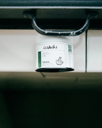Yabukita single cultivar matcha ceremonial grade powder by isshiki in a white jar on Tampa Home & Garden Store