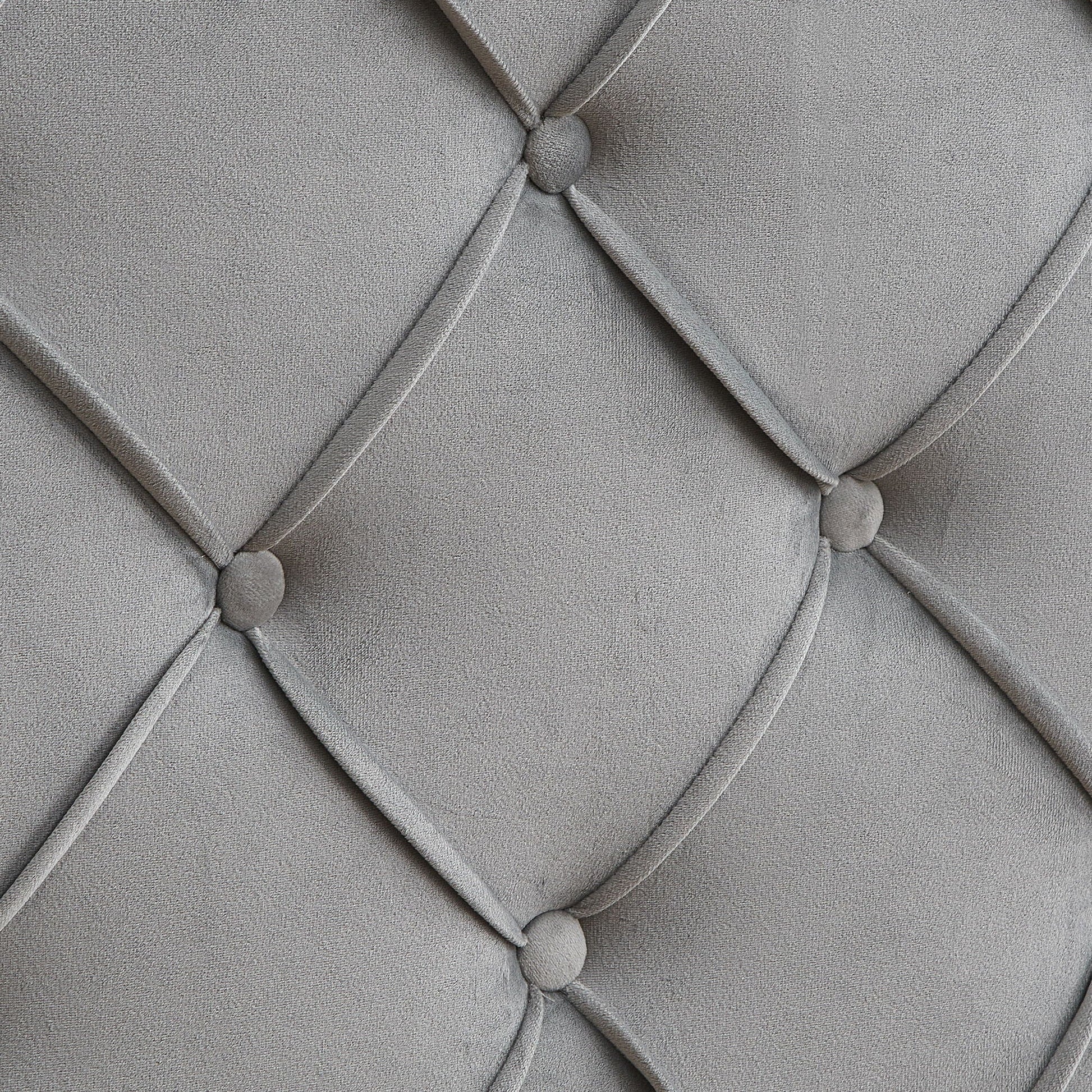 Queen platform bed gray upholstery close-up with button tufting and diamond pattern piping on Tampa Home & Garden Store