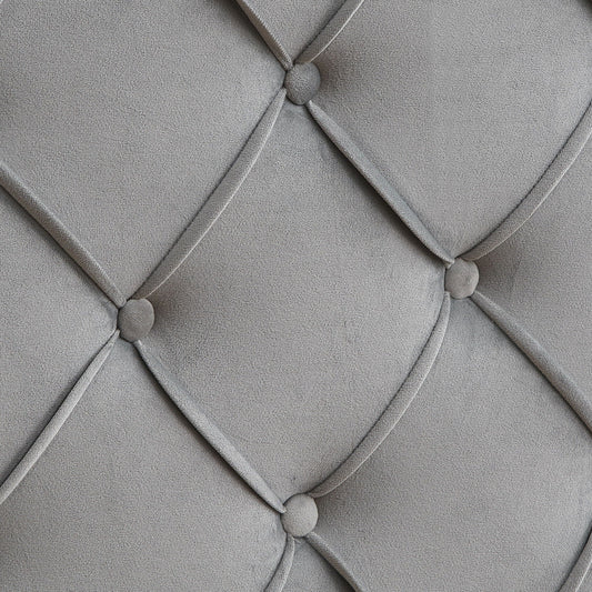 Queen platform bed gray upholstery close-up with button tufting and diamond pattern piping on Tampa Home & Garden Store