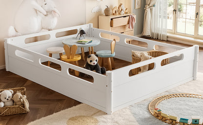 Queen size floor platform bed with full-length guardrails in white in a kids' room with table on Tampa Home & Garden Store