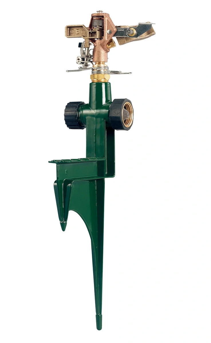 Brass impact sprinkler on green metal step spike with Orbit Irrigation branding on Tampa Home & Garden Store
