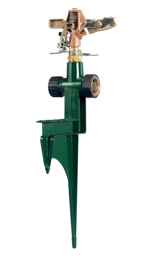 Brass impact sprinkler on green metal step spike with Orbit Irrigation branding on Tampa Home & Garden Store