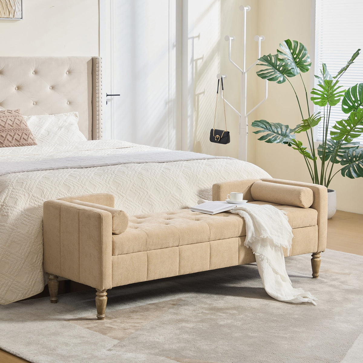 Beige chenille upholstered end-of-bed storage bench with cushioned top and turned wood legs on Tampa Home & Garden Store