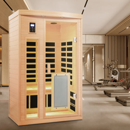 Two-person infrared sauna in light hemlock wood with glass door and wall-mounted touch control panel on display on Tampa Home & Garden Store