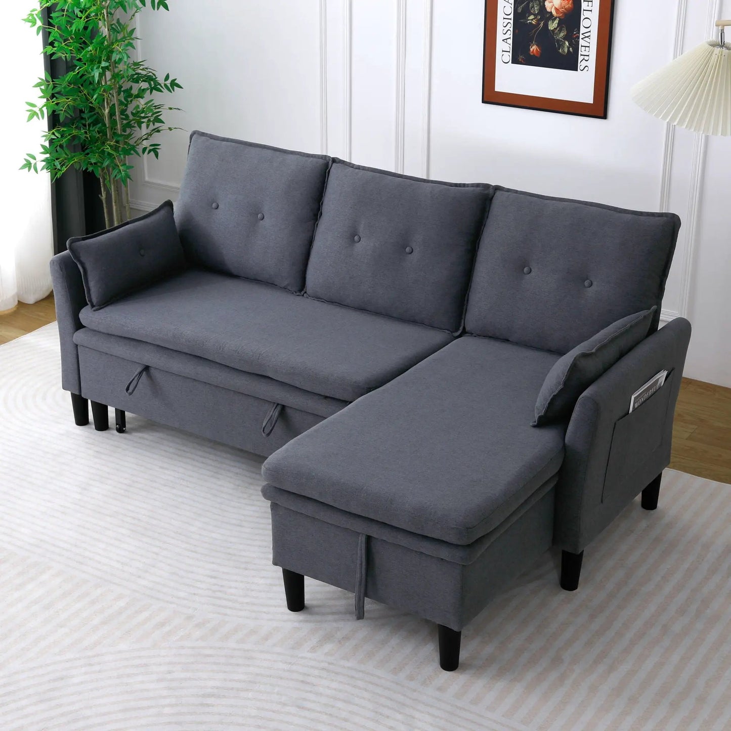 L-shaped reversible chaise sectional sofa in dark gray fabric with tufted cushions and storage on Tampa Home & Garden Store