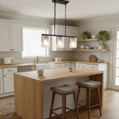 Adjustable cylindrical pendant light with frosted glass shades and black metal frame on Tampa Home & Garden Store