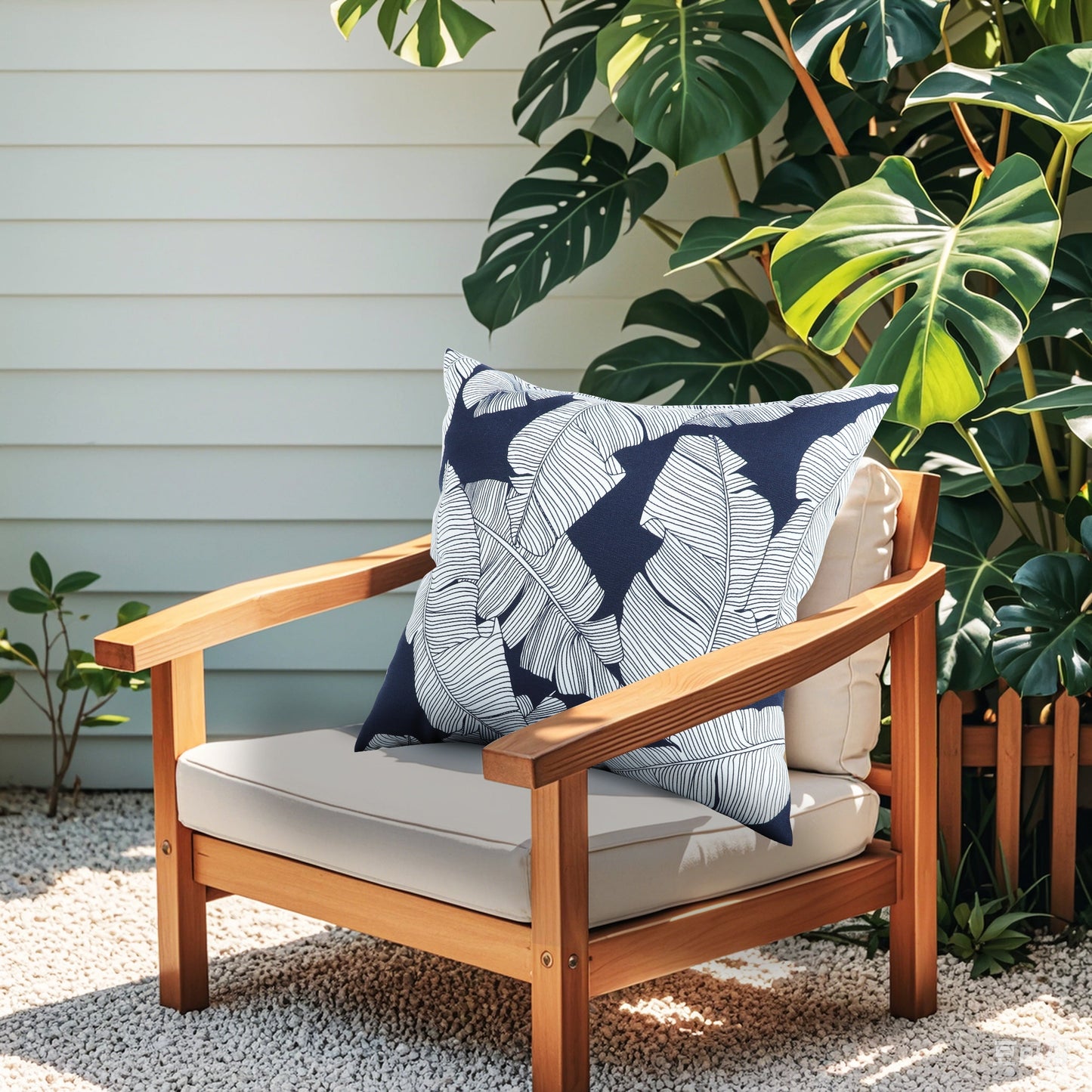 Two Waterproof Outdoor Throw Pillows and Garden