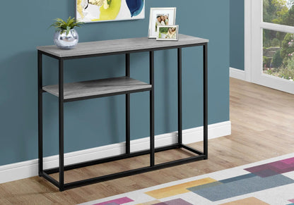 Accent console table with gray wood top and black metal frame; vase and two photo frames on Tampa Home & Garden Store