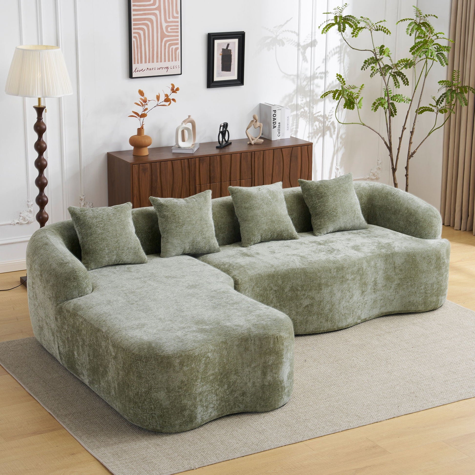 Modular L-shape sectional sofa with curved chaise in sage green fabric on Tampa Home & Garden Store