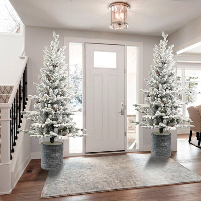 2FT Flocked Christmas Tree with Pot Base pair, snow-covered branches in gray textured pots on Tampa Home & Garden Store