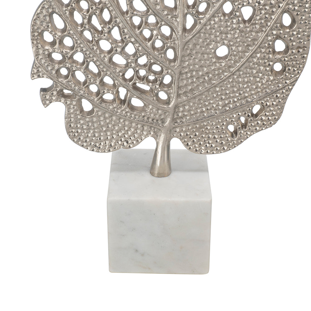 D15x29.3in table lamp with a silver perforated metal leaf sculpture on a white marble cube base on Tampa Home & Garden Store