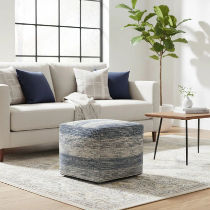 Clay square upholstered pouf in gray fabric, accent pouf on Tampa Home & Garden Store
