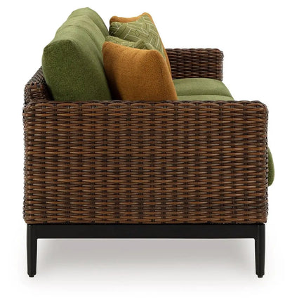 Horizon Hall sofa brown woven rattan frame with green and orange cushions Unique Piece Furniture on Tampa Home & Garden Store