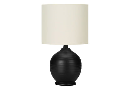 Table lamp with black ceramic base and cream fabric shade on Tampa Home & Garden Store