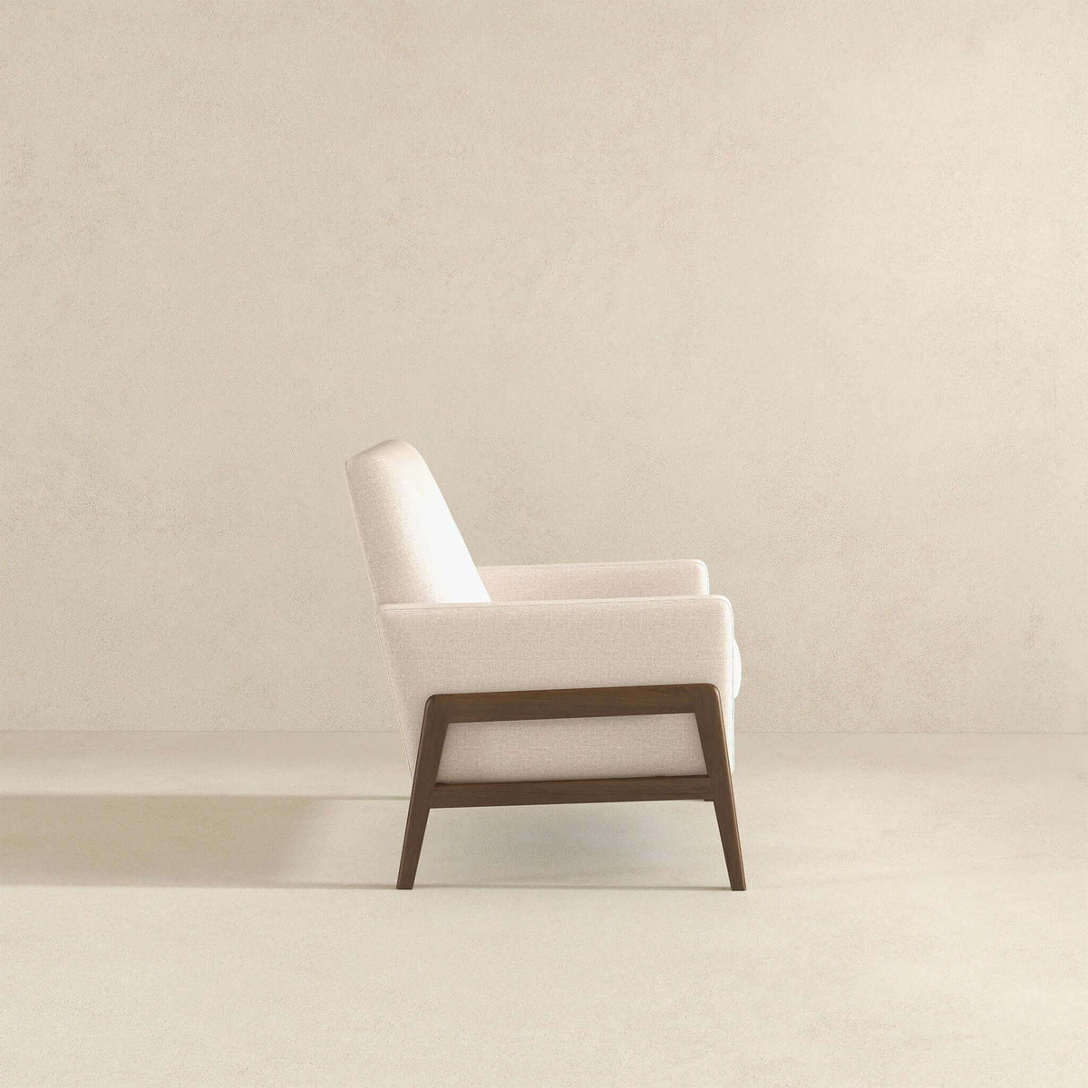 Cole Solid Wood Lounge Chair with beige upholstery and dark wood legs, mid-century armchair on Tampa Home & Garden Store