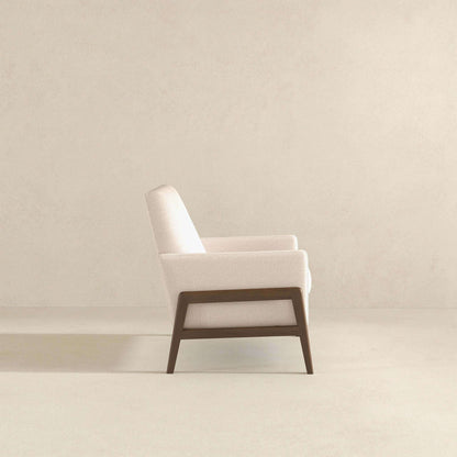 Cole Solid Wood Lounge Chair with beige upholstery and dark wood legs, mid-century armchair on Tampa Home & Garden Store