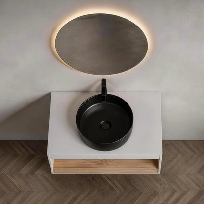 Floating vanity with glossy round black vessel sink on white countertop, wall-mounted with drawer on Tampa Home & Garden Store
